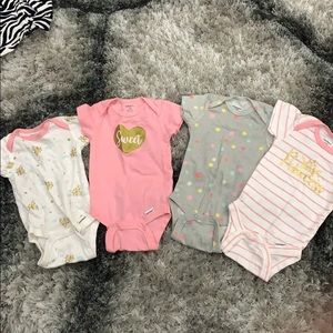 Gerber onsies , almost brand new